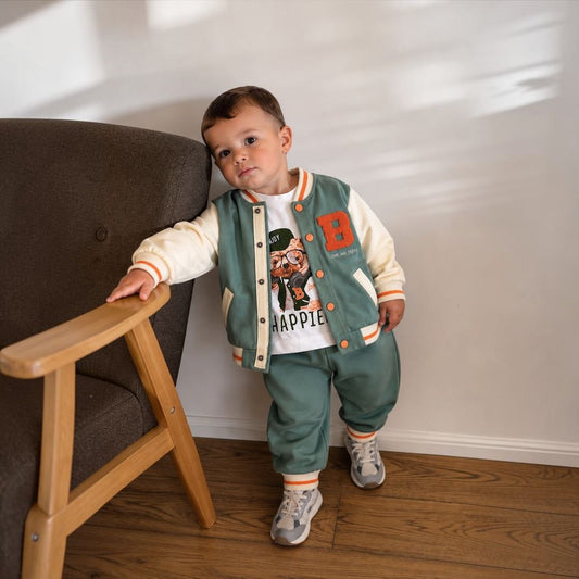 Baby boy wearing varsity bear set in sage green