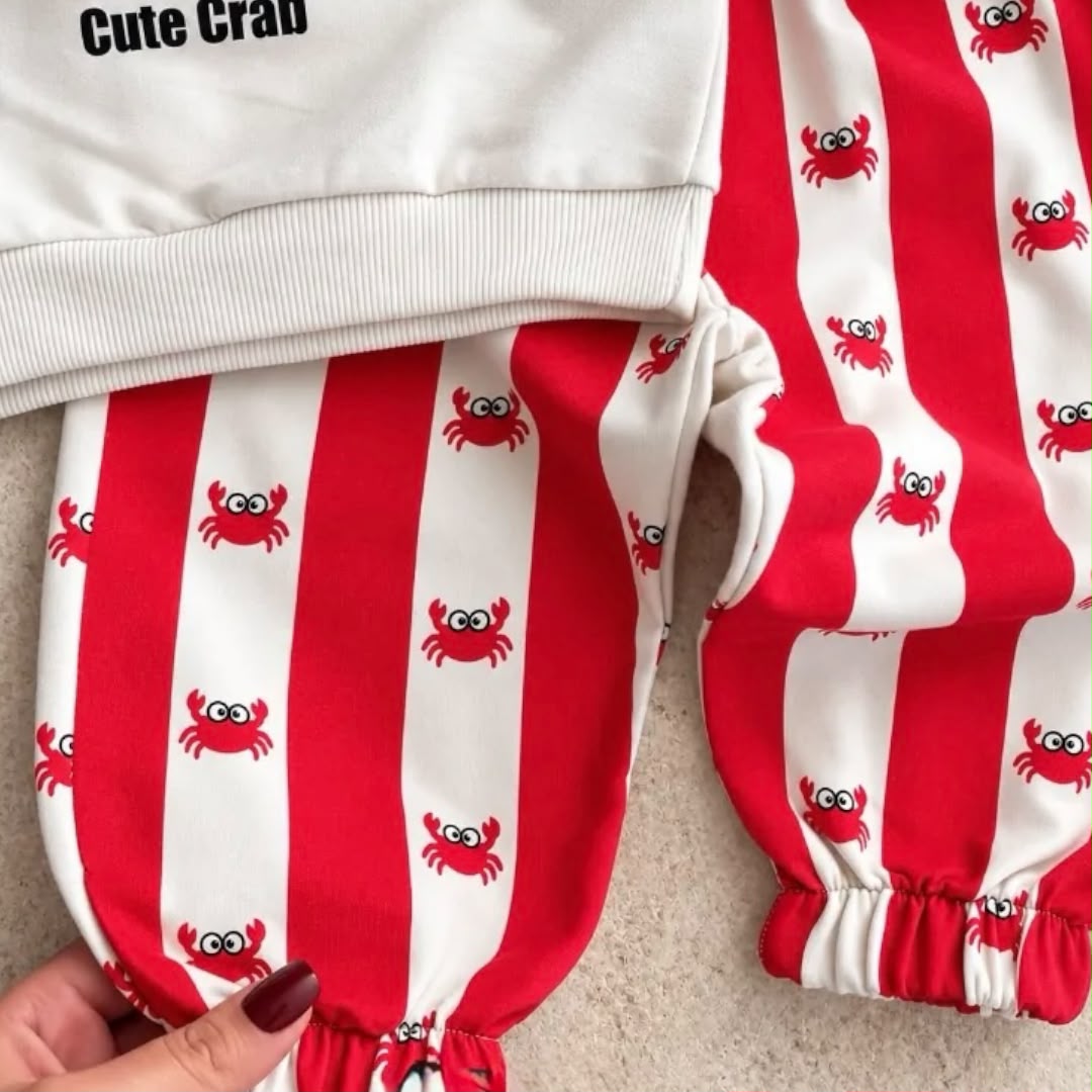 Red and white striped baby joggers with small crab prints