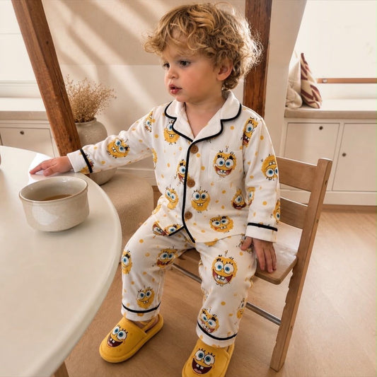 Baby boy wearing cartoon character pajama set