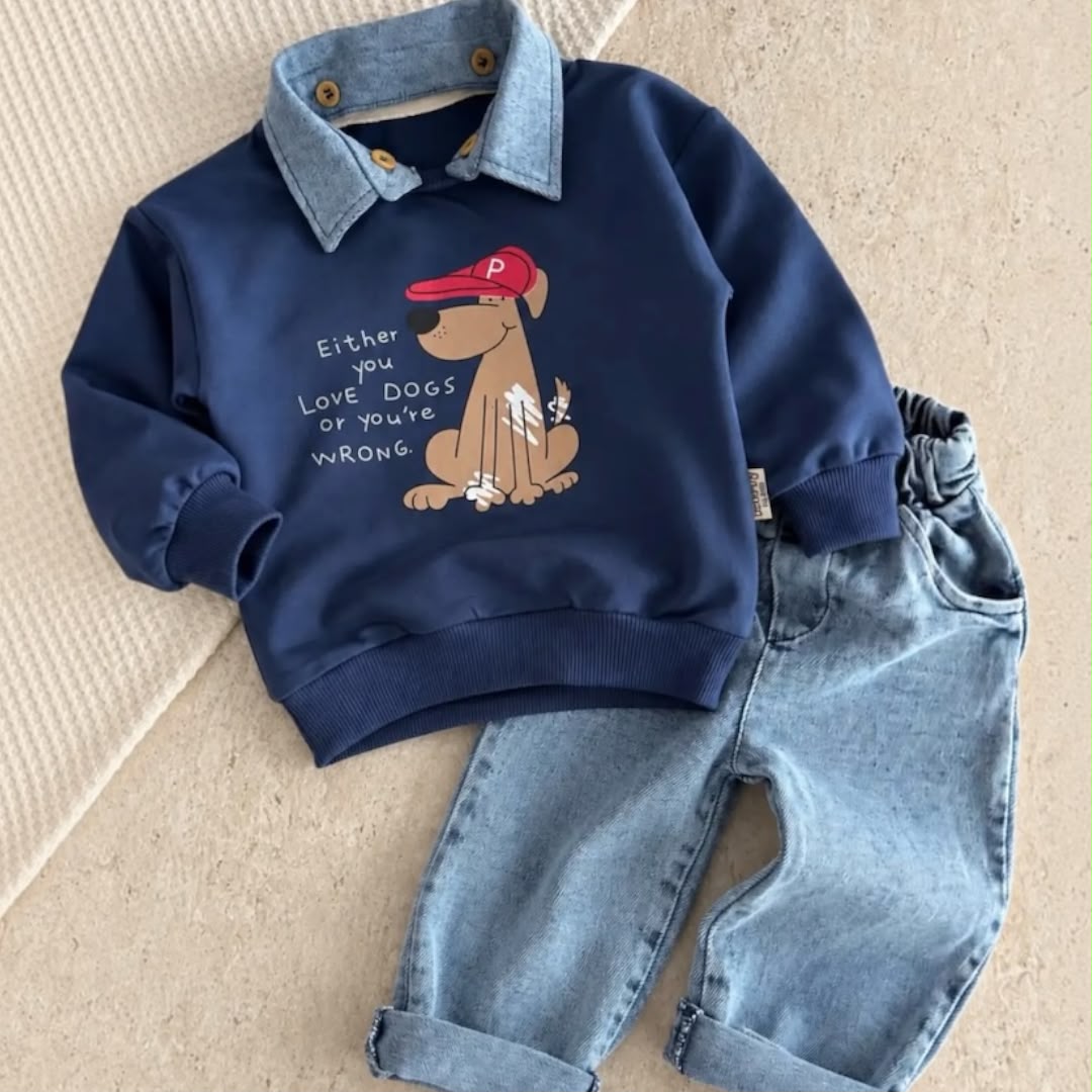 Navy dog-print collared baby sweatshirt and light-blue jeans laid flat
