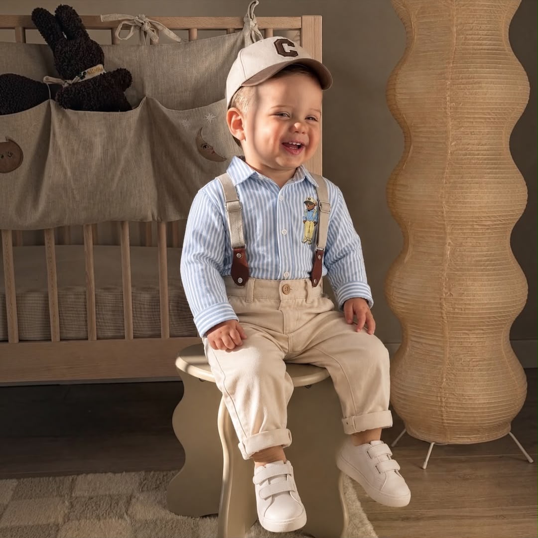 Baby boy wearing Bear Stripe Set sitting