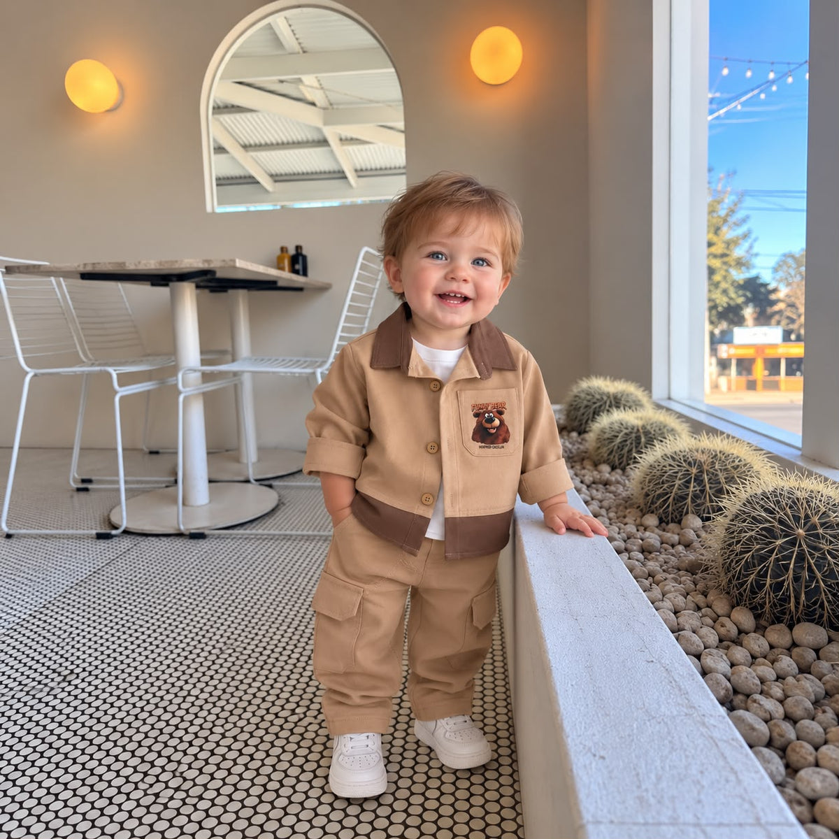 Toddler wearing tan Funny Bear shirt jacket and cargo trousers