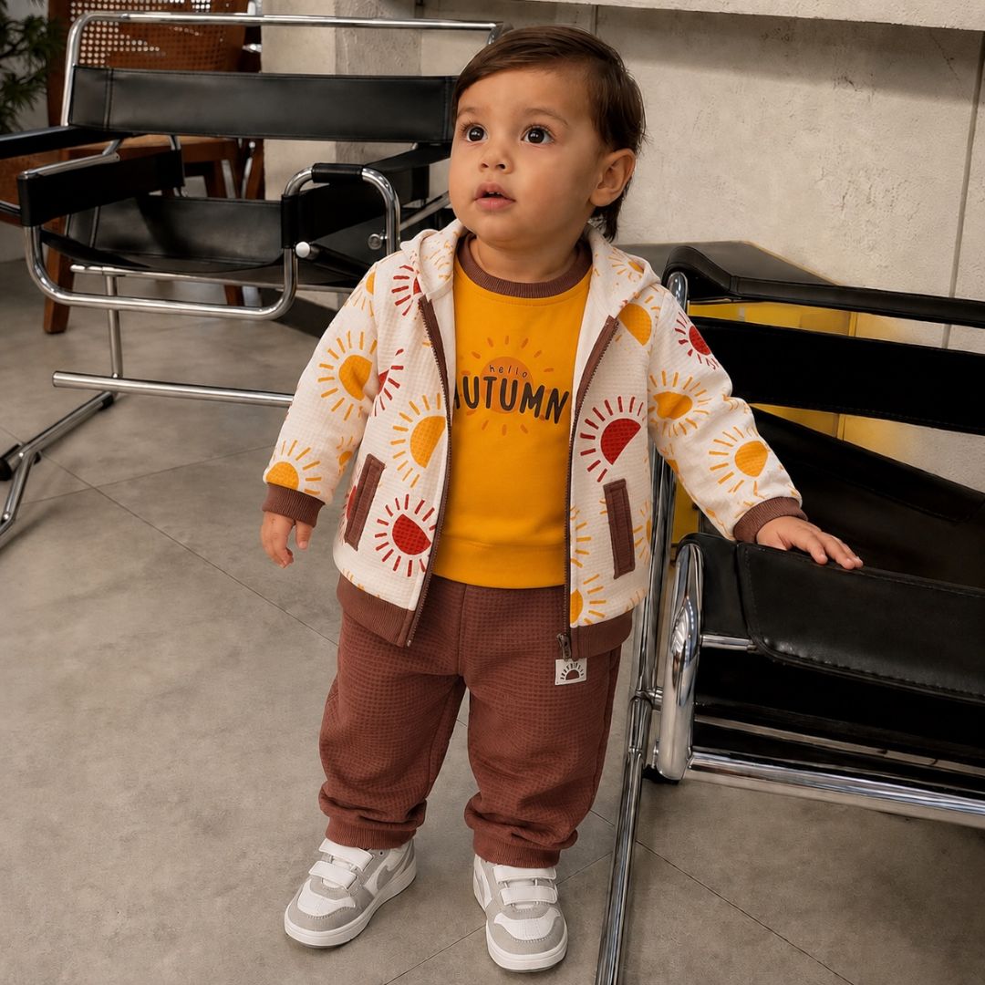 Baby boy wearing Hello Autumn 3-piece set with zip hoodie and brown jogger pants