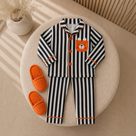 Kids Striped Pyjama Set Teddy Bear design flat lay with orange slippers