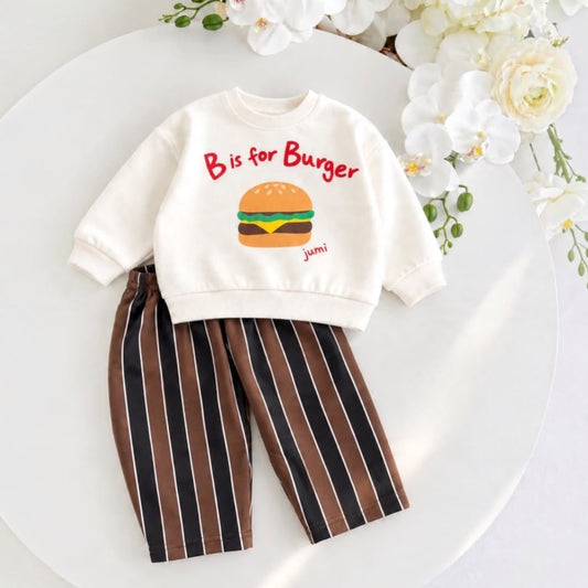 Cream B is for Burger baby sweatshirt with brown and dark striped trousers laid flat