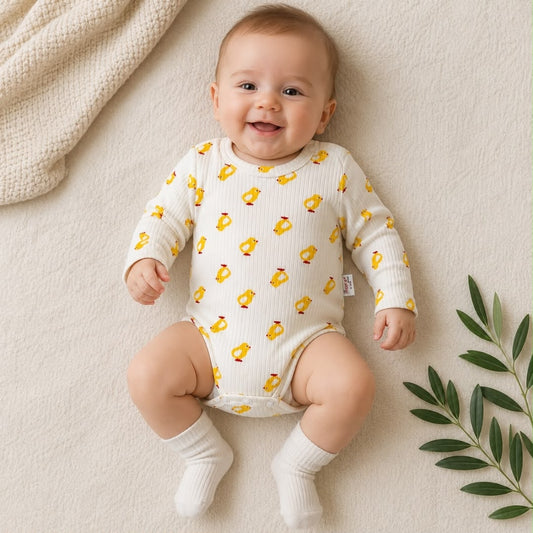 Baby wearing Chick Print Ribbed Bodysuit smiling